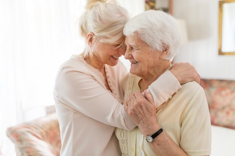 Assured Quality Homecare - stock image - Elderly care - mother daughter