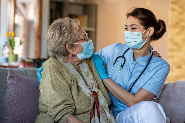 NursePower - Stock image - Nurse image with patient